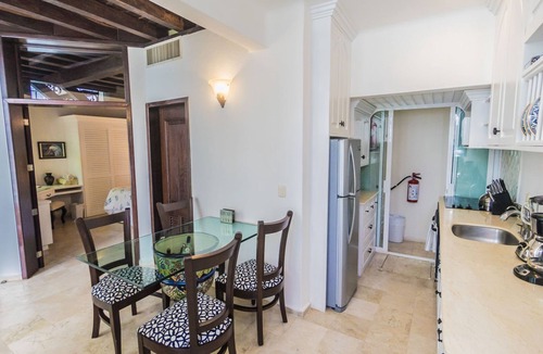 Downtown Condo | 2 Bedroom condo with a 2 level high Living Room by BRIC at the Royal Palms