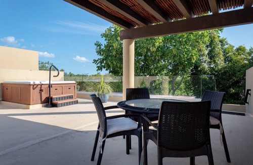 Playacar Fase II Condo | 4 Pools and Budget Penthouse in Vaiven. From BRIC Vacation Rentals