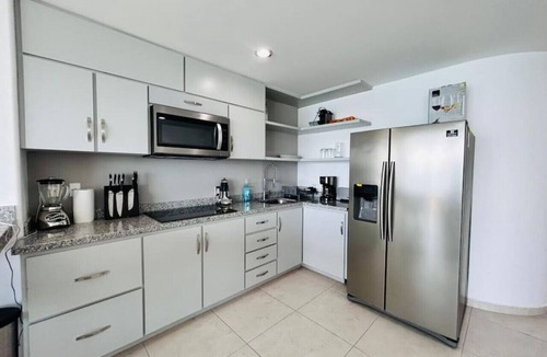 Zona Dorada Apartment | a pie de playa con vista al mar by Gpsrentas