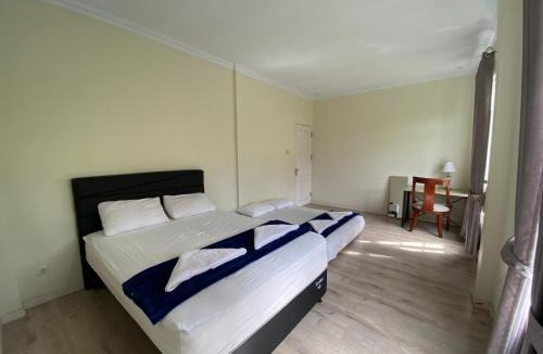 Tomohon Villa | A Spacious Tropical 4 Bedrooms with Bathrooms Villa Marion Tomohon with the view of Gunung Lokon
