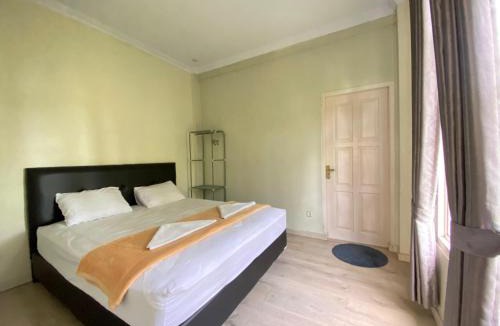 Tomohon Villa | A Spacious Tropical 4 Bedrooms with Bathrooms Villa Marion Tomohon with the view of Gunung Lokon
