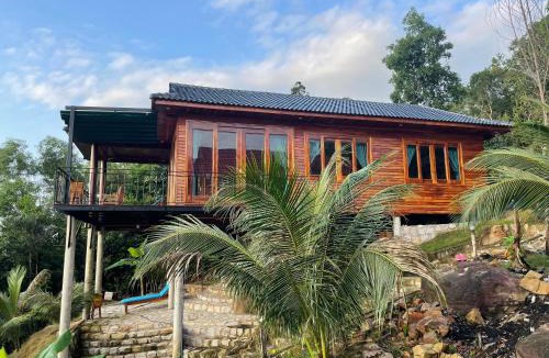 Ham Ninh Ski Chalet | Amazing sunrise over wooden house at the East
