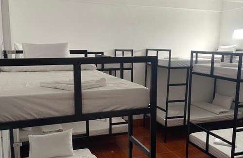 Vang Vieng Hostel | Amigos Rooftop Mountain View Hostel
