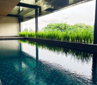 Bangka Apartment | Apt Kemang Village Tower Intercon with Wi-Fi and Pool by Damaresa