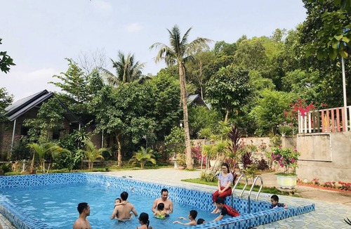 Tran Chau House | Beautiful Family Bungalow with swimming pool 5 mins to the beach.
