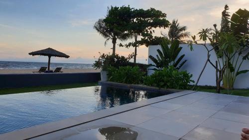 Phuoc Thuan Villa | Biệt thự mặt tiền biển-hồ bơi riêng-4 phòng ngủ