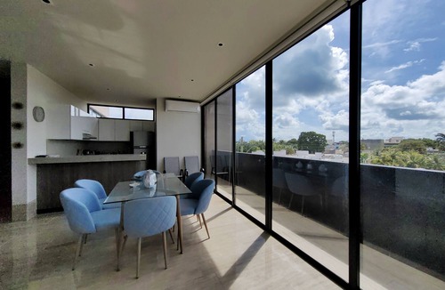 Colonia Centro Condo | Brand New Build - best Location 2 blocks from the fery ocean view Pool Roof Top.