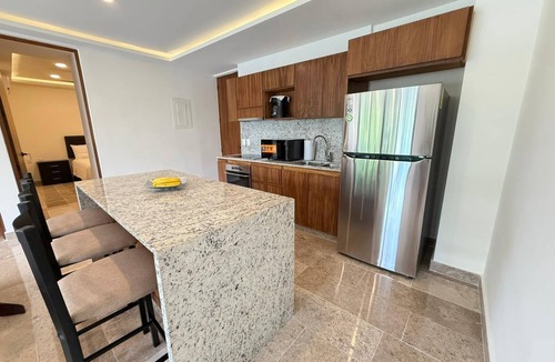Colonia Centro Condo | BRAND NEW Luxurious Ocean Front Condo with Pool in the heart of downtown Cozumel