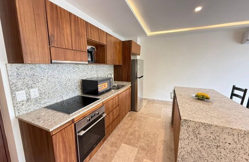 Colonia Centro Condo | BRAND NEW Luxurious Ocean Front Condo with Pool in the heart of downtown Cozumel