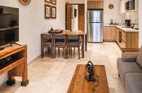 Gonzalo Guerrero Condo | Chic Condo Steps to Beach w Rooftop Pool and Parking