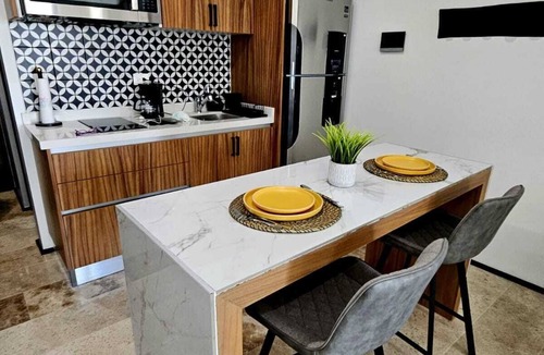 Gonzalo Guerrero Apartment | Chic Upper-Floor Condo with Rooftop Ocean Views Steps from Mamitas Beach 5th Ave