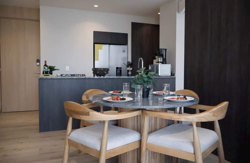 Providencia Condo | City-view condo w/pool & free parking