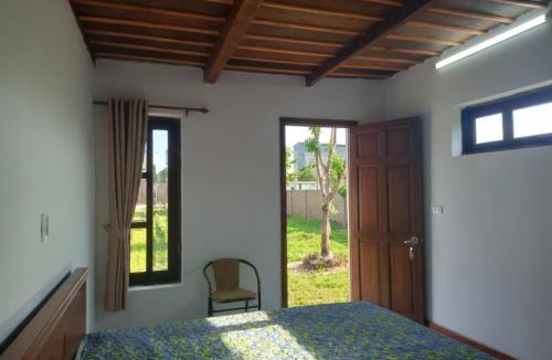 Dat Do House | CocoPalm Villa near Beach - Palm Room