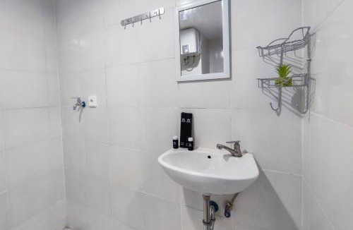Jatingaleh Apartment | Comfort and Well Design Studio at Paltrow City Apartment By Travelio