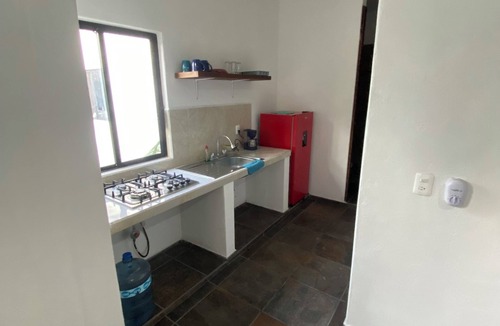 Los Ayala Apartment | Costa Ayala suite 9 with 1 QS bed and 2 sofas, all basics, 2 blocks from beach