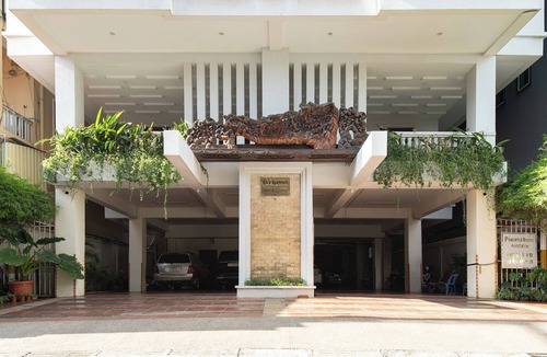 Chamkar Mon Condo | Cozy 1BR condo with hardwood floors and rooftop sunset garden in Phnom Penh