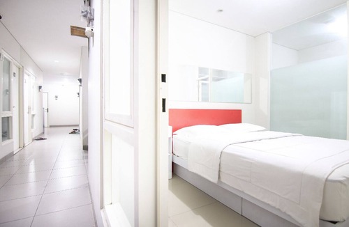 Darmo House | Cozy bedroom Kanwa Darmo