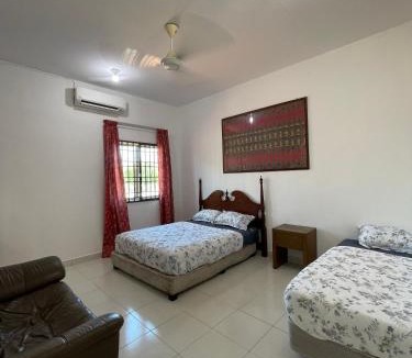 Kampung Telaga Batin Apartment | Cozy Family Stay Near Beach, Airport & Stadium