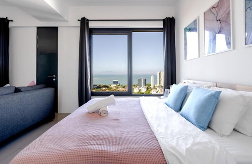 Downtown George Town Apartment | De Pastel Studio - SeaView at 218 Tropicana NEAR Komtar Food Heaven with Netflix & TV Box