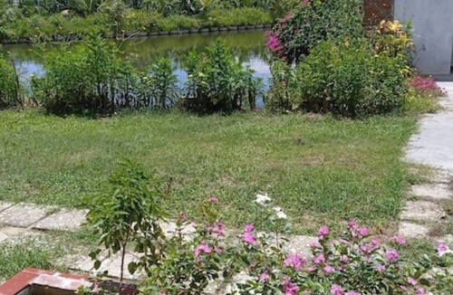 Cam Thanh Apartment | Deluxe Double King Room with Balcony, River view