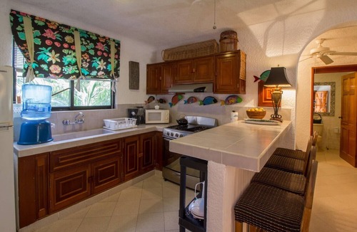 Akumal Condo | Enjoy the ambience of this beachfront condo located in South Akumal!