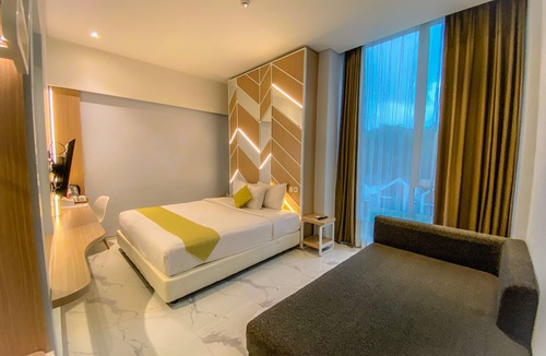 Hargomulyo Hotel | Facade Hotel by Azana
