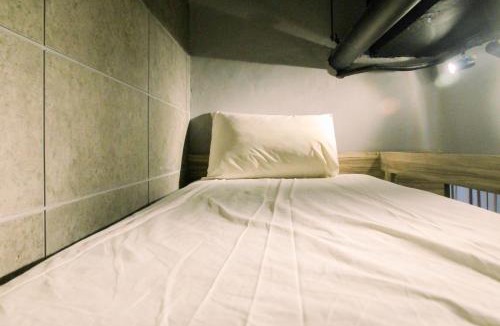 Pondokcina Apartment | Homey 1BR at 15th Floor Apartment at Atlanta Residences By Travelio