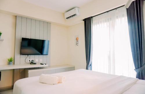 Pondok Aren Apartment | Homey and Simply Look 1BR Bintaro Embarcadero Apartment By Travelio