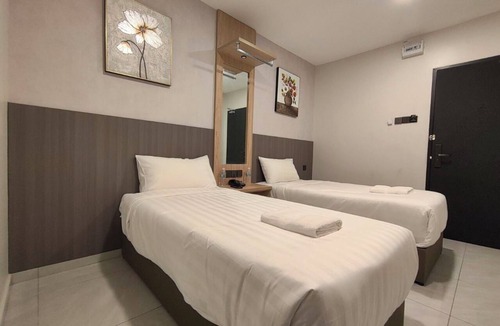 Bandar Saujana Putra Hotel | Hotel Mawar Inn