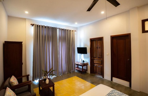 Sangkat Sla Kram Hotel | Isann Suites