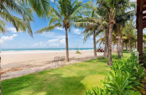 Phuoc Thuan Hotel | Liséa Wonderland Resort Deluxe Bedrooms by Private Beach