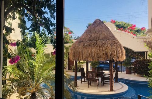 Gonzalo Guerrero Villa | Luxurious 1-Bedroom condo on Calle 38 with beautiful pool. A Playa favorite!