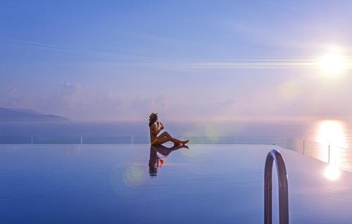 Suoi Nuoc Beach Hotel | Mandala Oceanfront Driftwood Resort