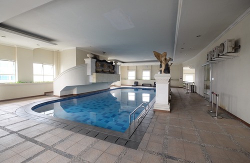 Kampung Bali Hotel | Minimalist and Cozy 1Br Apartment at The Boulevard