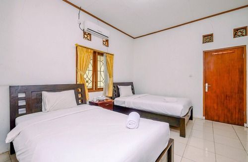 Caringin Apartment | Minimalist Studio Room At Graha Wishnu Guest House