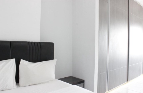 Cibaduyut Apartment | Modern & Spacious 1BR at Mekarwangi Square Apartment By Travelio