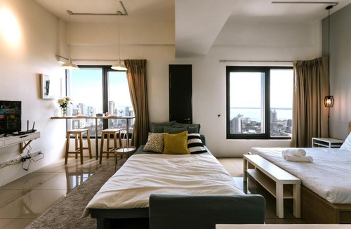 Downtown George Town Apartment | MUJI Studio 2 - Seaview at 218 Tropicana Near Komtar Food Heaven with Netflix & TV Box