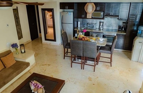 Downtown Condo | Oceanfront condo on beach w hot tub! Minutes walk to restaurants & bars! 2pools