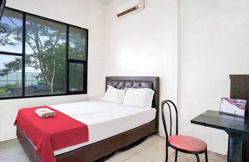 Singkawang Hotel | OYO 92609 Guest House Malay Singkawang