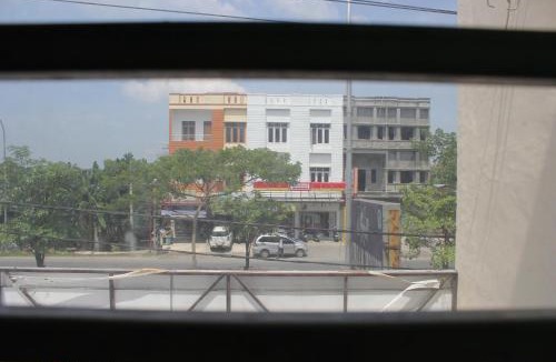 Medan House | Penginapan Transit Tomato