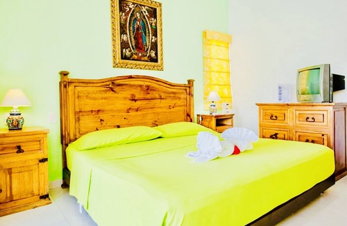 Playacar Bed & Breakfast | Playacar Deluxe Budget Balcony Room With Swimming Pool Air Conditioning and Park