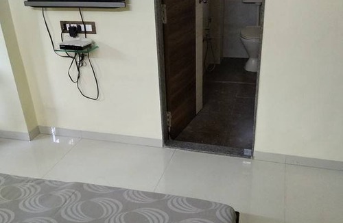 J B Nagar Resort | Private room ∙ 2 guests