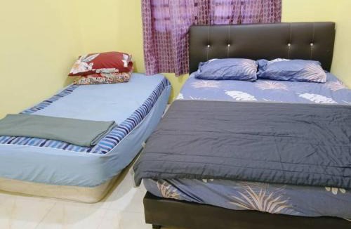 Rambai House | Rumah Kuning Homestay