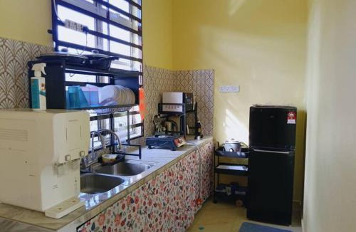 Rambai House | Rumah Kuning Homestay