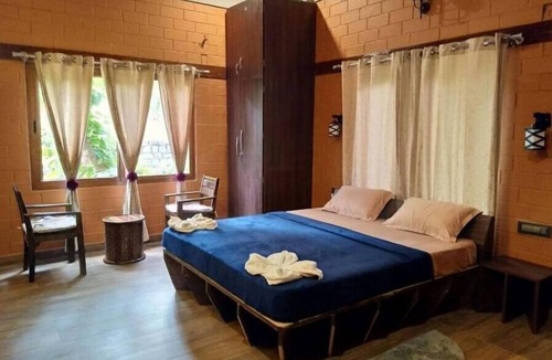 Kaimane House | Rustic Charm Wayanad - Interlocked (Entire studio)