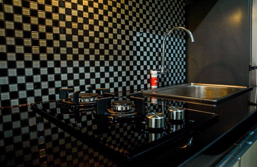 Panunggangan Utara Apartment | Simply Studio Room at Grand Serpong Apartment By Travelio