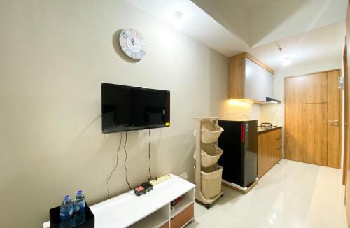 Duren Sawit Apartment | Simply Studio Room Gateway Park LRT City Jatibening Apartment By Travelio