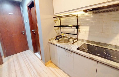 Surabaya Apartment | Spacious 2Br With Extra Room At Grand Sungkono Lagoon Apartment