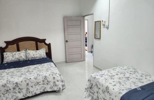 Kampung Telaga Batin Apartment | Spacious Family Homestay Near Airport & Beach