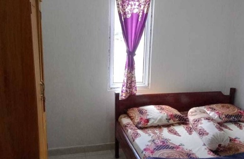 West Pesisir Hotel | SPOT ON 91371 Wisma Nadira Near SPBU PT. Trijaya Pugung PENENGAHAN